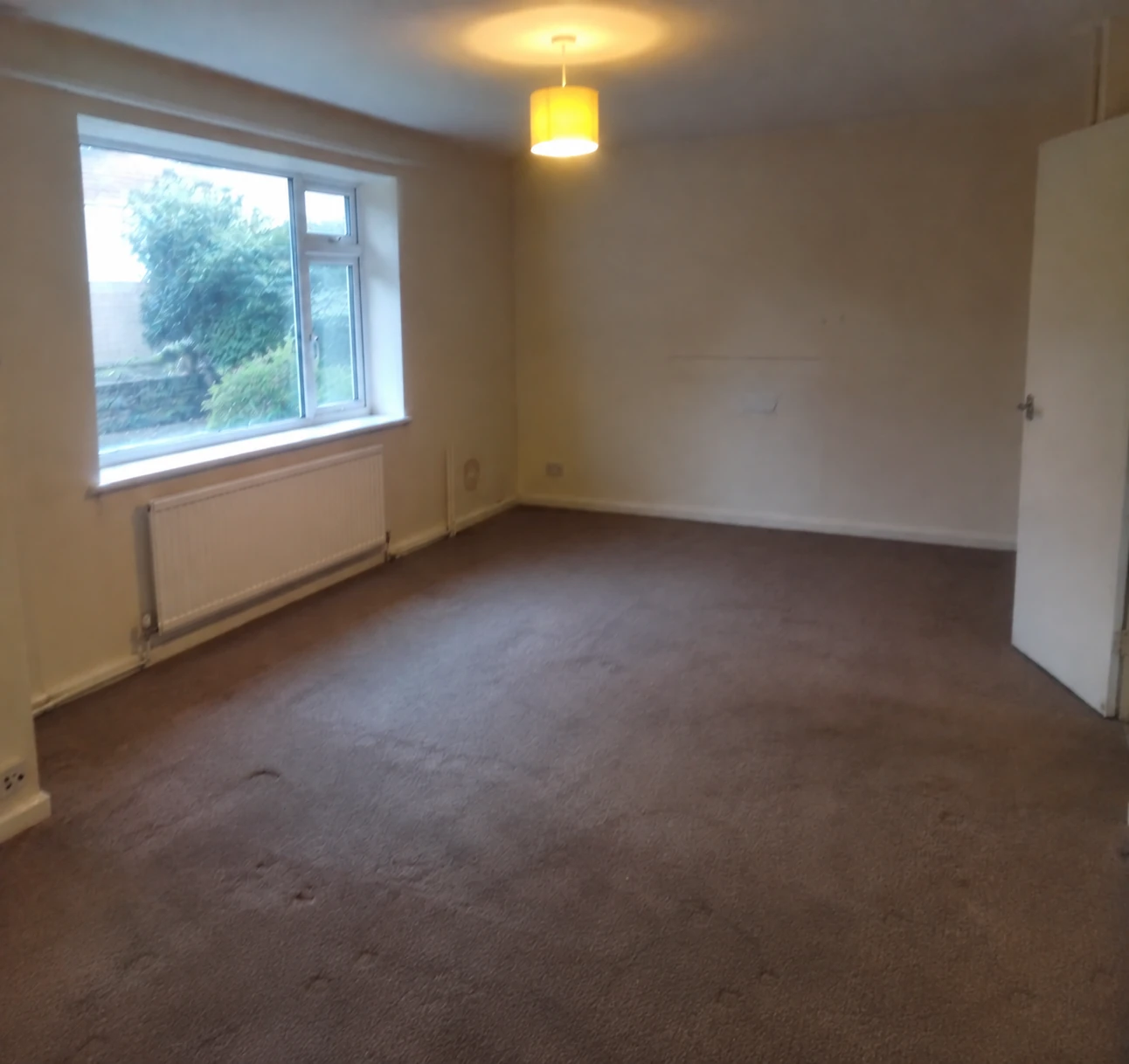 Vacant living and alfresco area before Studio Leafi virtual staging
