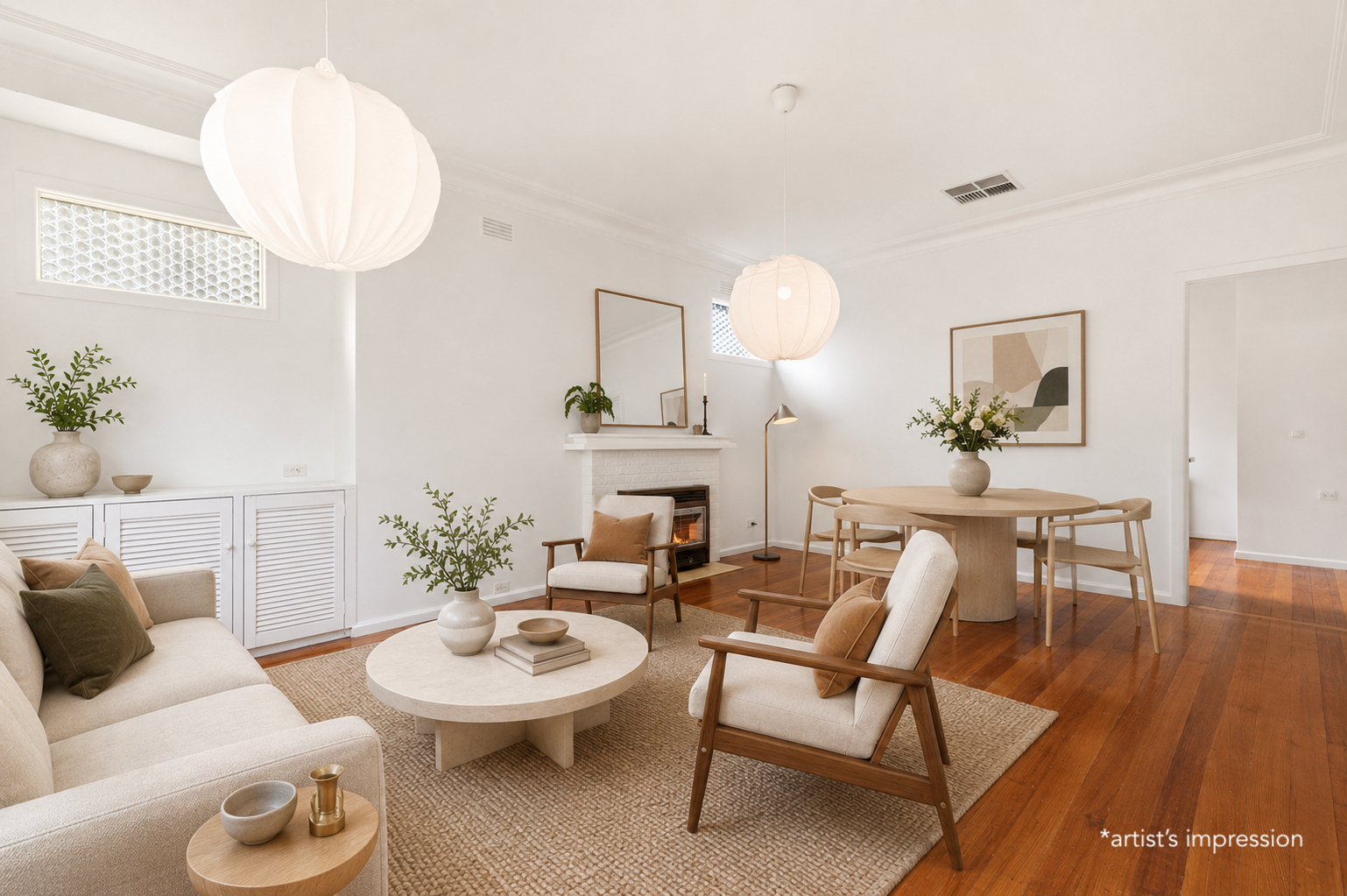 After virtual staging: beautifully zoned open-plan living area showing defined lounge and dining spaces